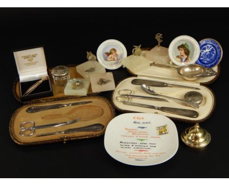 Various silver and other trinket items, to include two silver part manicure sets, a silver bookmark, silver tea strainer, ony