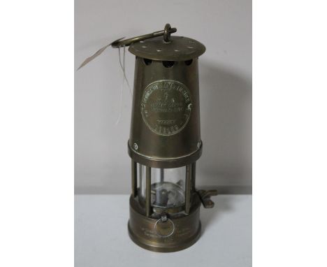 A brass Eccles Protector Type 6 miner's lamp