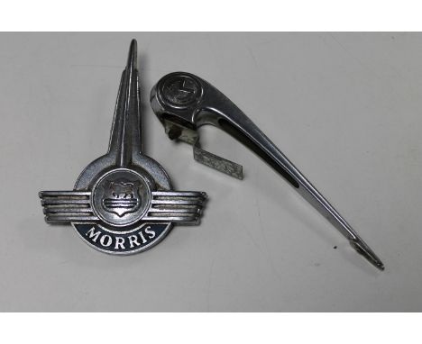 A vintage Morris car bonnet ornament and a Morris lorry badge 