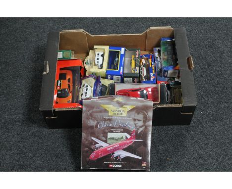 A box of boxed die cast vehicles, Revell, Corgi, Aviation Archive etc