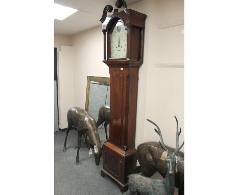 A George III mahogany eight day longcase clock with painted dial signed William Rust, Hull, height 228 cm.