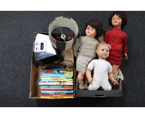 A box containing four mid 20th century plastic headed dolls together with a further box of Dandy and Beano children's annuals