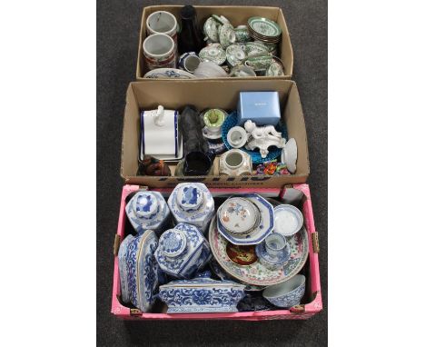 Three boxes containing Chinese blue and white porcelain table lamp, lidded vases, tea china etc 