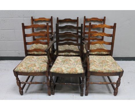 A set of six oak ladder back dining chairs 