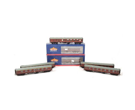 Bachmann OO gauge model railway passenger coaches; seven BR MK1 Suburban maroon coaches, E13030, E15145, M35180, M4414, Resta