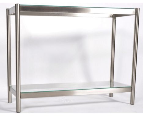 A retro vintage 20th Century glass &amp; brushed metal two tier side table. Comprises two glass shelf tiers set to a brushed 