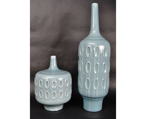 Two large contemporary Scandi blue ceramic vases of decorative form each with geometric maouled patterns throughout. Largest 