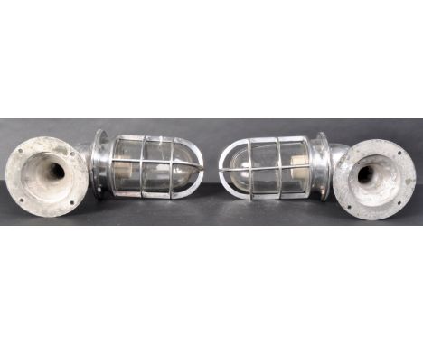 A pair of vintage maritime / nautical swan neck chrome bulkhead passage lights, with caged glass shades and ceramic fittings.
