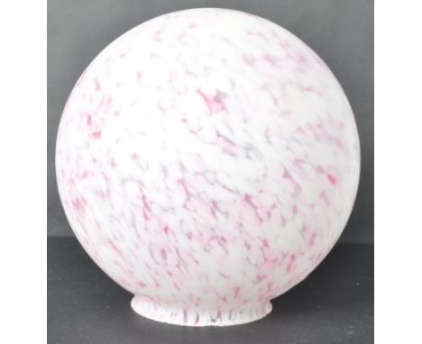 A vintage 20th Century Art Deco ceiling light glass shade of globe form having a mottled pink finish. Wear commensurate with 