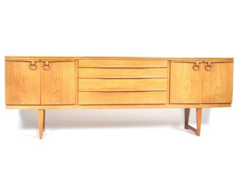 Beautility - A retro vintage 1970s teak wood sideboard credenza having a central bank of four graduating drawers flanked by d