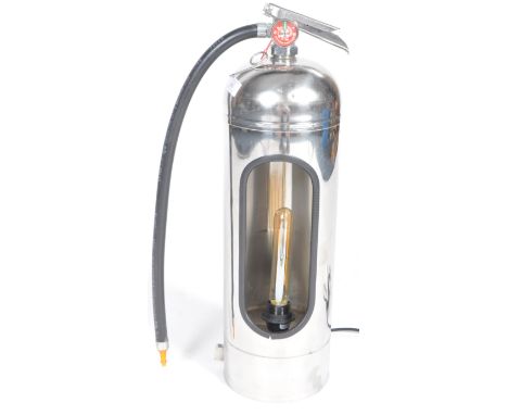 A retro vintage 20th century Fire Extinguisher lamp. Converted from a fire extinguisher and finished in chrome with central o