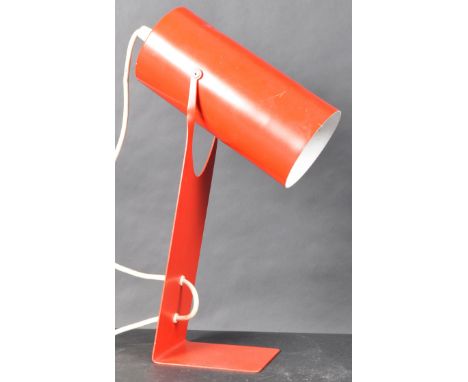 Luma vintage desk lamp,&nbsp;cylindrical adjustable shade supported on a L shaped stand, with switch button to cord. Measures