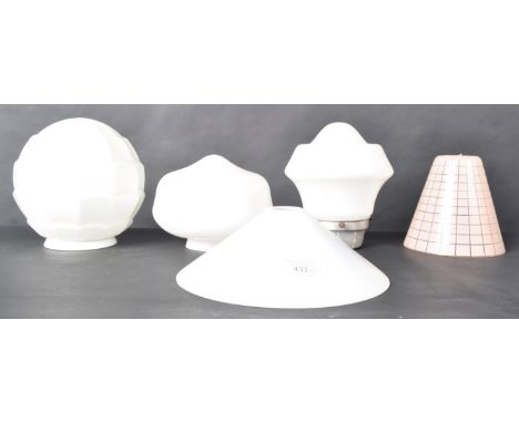A collection of five early - mid 20th Century glass light lamp shades comprising a conical example, striped example and three