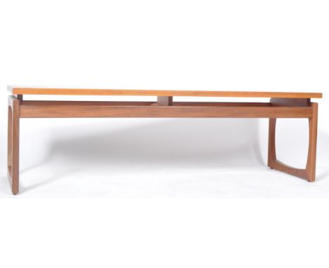 R. Bennett - G Plan - Quadrille Range - A retro 1970s teak wood low table / coffee table having a floating rectangular top su