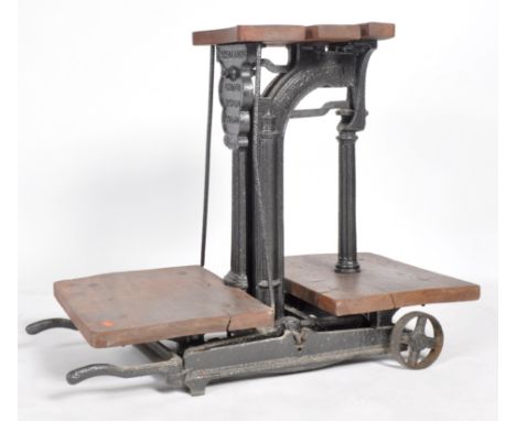 A retro vintage early 20th Century Bristol interest Parnall &amp; Son cast iron and wood shop scales. Makers name cast into t