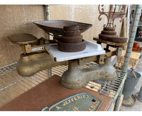 TWO SETS OF VINTAGE BALANCE SCALES TO IUNCLUDE AN AVERY SET AND AN ASSORTMENT OF CAST IRON WEIGHTS 