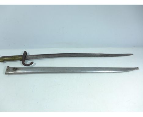 A FRENCH CHASSEPOT BAYONET AND SCABBARD DATED 1867, 57CM BLADE, LENGTH 72.5CM 