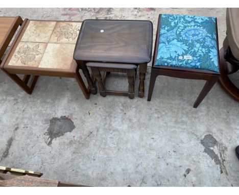 A RETRO TEAK TILED TOP LAMP TABLE, STAG MINSTREL STOOL AND NEST OF TWO OAK TABLES 