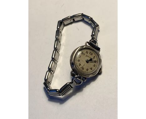 A VINTAGE LADIES SERVICES WRIST WATCH IN A PRESENTATION BOX 