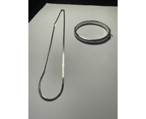 A SILVER BANGLE AND NECKLACE 