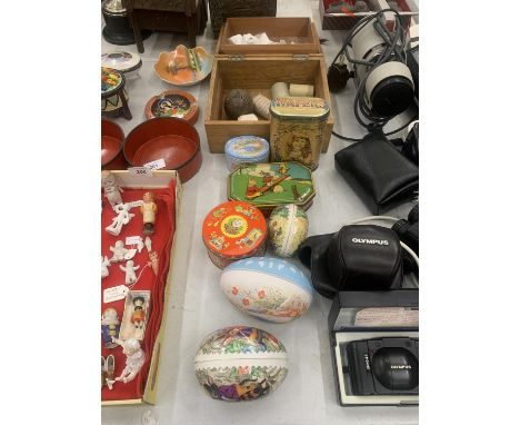 A QUANTITY OF COLLECTABLE TINS, EGGS, A FIRST AID BOX, ETC 