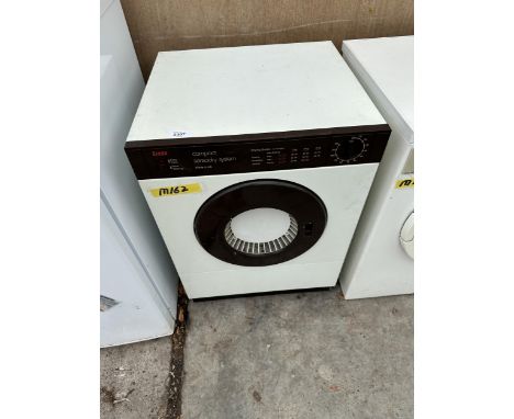 A SMALL CREDA COMPACT SENSADRY TUMBLE DRYER 