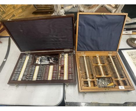 TWO VINTAGE CASED OPTICIANS GLASSES TESTING CASES 