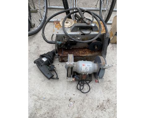 A PROFORMANCE BENCH GRINDER, AN ELECTRIC DRILL AND A MIG WELDER 
