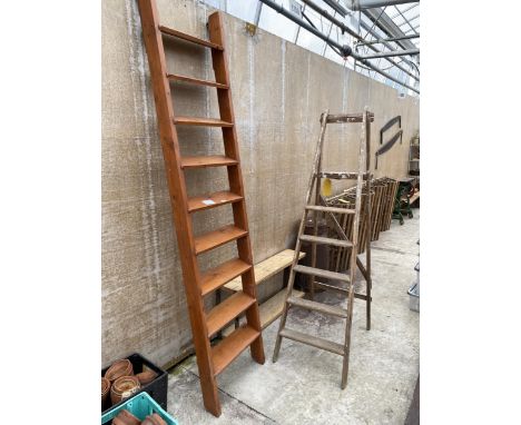 A WOODEN NINE RUNG LADDER AND A VINTAGE FIVE RUNG WOODEN STEP LADDER 