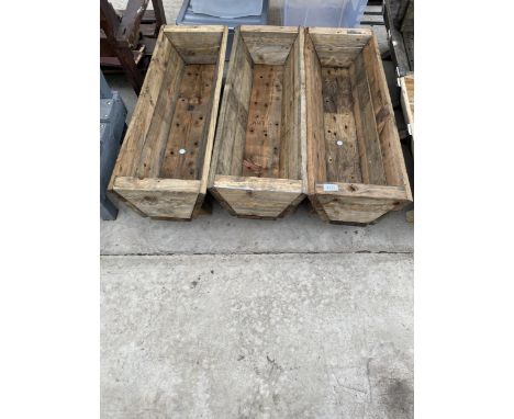 THREE RUSTIC WOODEN TROUGH PLANTERS 