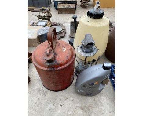 A PARAFIN LAMP AND A LARGE FUEL CAN 