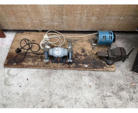 A WOODEN BOARD WITH A BENCH GRINDER, A BENCH VICE AND A SHARPENING STONE 