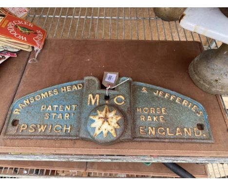 A VINTAGE CAST IRON RANSOMES HEAD &amp; JEFFERIES HORSE RAKE PLAQUE 