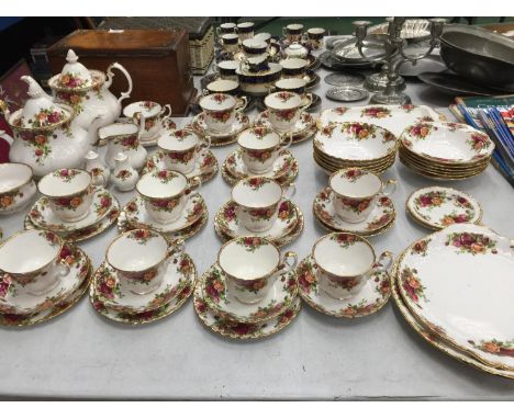 A LARGE QUANTITY OF ROYAL ALBERT 'OLD COUNTRY ROSES' TEAWARE TO INCLUDE TWO TEAPOTS, CAKE PLATES, BOWLS, CREAM JUG, SUGAR BOW