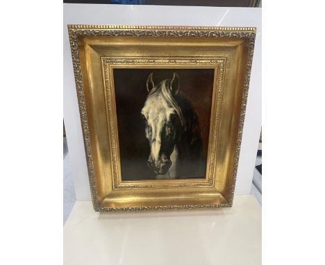 A GILT FRAMED PRINT OF A HORSE 