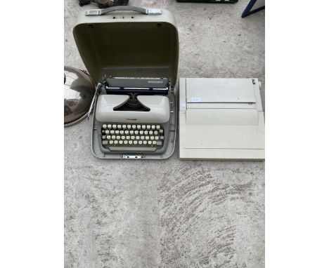 A JUNIOR-E TYPE WRITER AND A FURTHER TYPEWRITER 