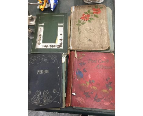 FOUR VINTAGE POSTCARD ALBUMS CONTAINING A QUANTITY OF POSTCARDS TO INCLUDE HUMOROUS EXAMPLES 