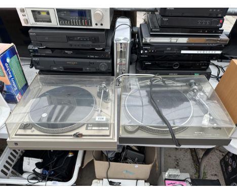 A ROTEL RECORD PLAYER AND A DUAL RECORD PLAYER 