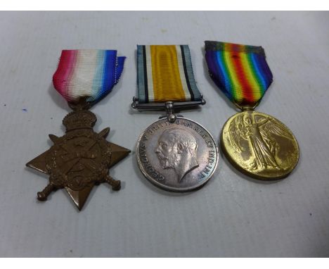 A WORLD WAR I MEDAL GROUP AWARDED TO TS - 3303 CORPORAL T H WILSON OF THE ARMY SERVICE CORPS COMPRISING 1914 (MONS STAR) WAR 