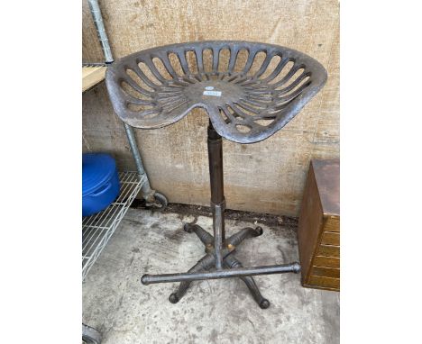 A VINTAGE STYLE TRACTOR SEAT STOOL 