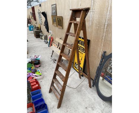 A VINTAGE EIGHT RUNG WOODEN STEP LADDER DATED 1960 AND BELIEVED TO BE FROM NORWEB 