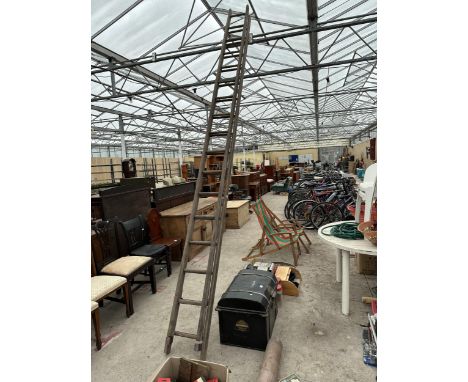 A VINTAGE TWO SECTION 16 RUNG WOODEN STEP LADDER 