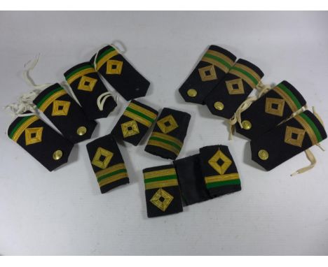 A COLLECTION OF FOUR ROYAL FLEET AUXILLARY EPAULETTES AND FURTHER RANK BADGES 