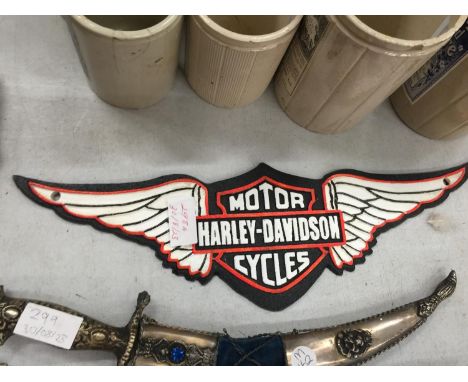 A CAST HARLEY DAVIDSON MOTOR CYCLE SIGN 