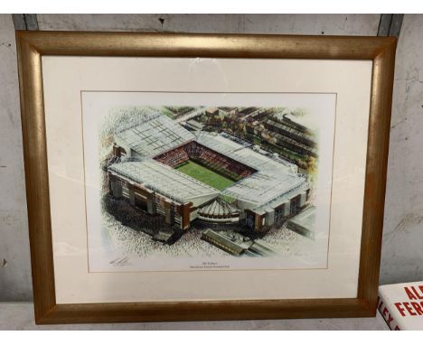 A GILT FRAMED OLD TRAFFORD MANCHESTER UNITED PRINT, PENCIL SIGNED 