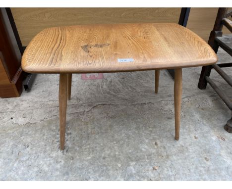 AN ERCOL BLUE LABEL ELM COFFEE TABLE, 28X18" 