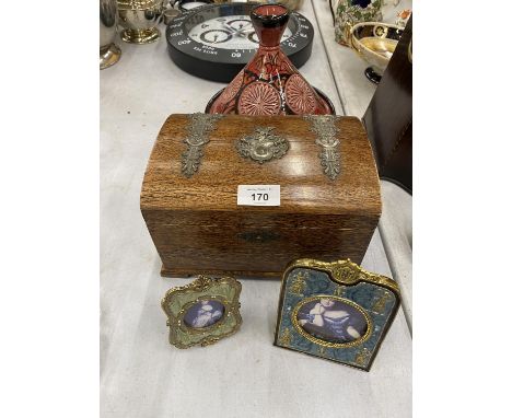 A VINTAGE DOMED BOX WITH METAL FITTINGS, A SMALL TAGINE PLUS TWO VINTAGE STYLE SMALL ENAMELLED PHOTO FRAMES 