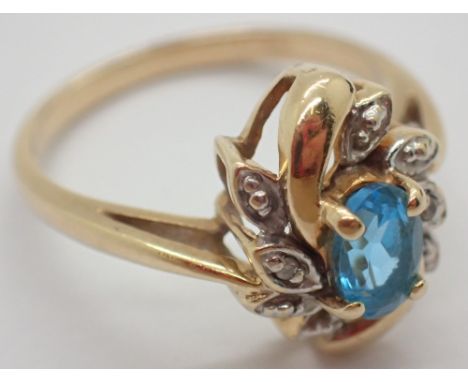 American 10ct gold blue topaz and diamond dress ring size K 2.5g