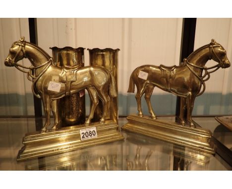 Matched pair of brass horse doorstops and a pair of trench art shell cases inscribed with fruit and flowers  Eypres 1911 