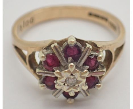 9ct gold ring with diamond and rubies size M 2.8g CONDITION REPORT: Ring is undamaged